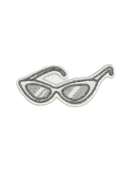 Embroidered iron-on patch of retro cat eye sunglasses in neutral tones