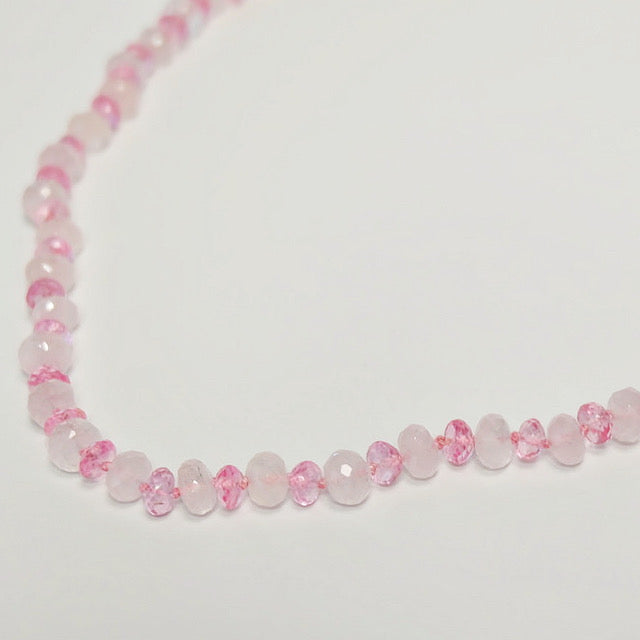 close up pink topaz rose quartz knotted necklace
