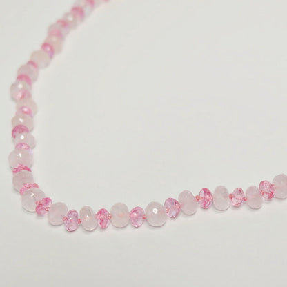 close up pink topaz rose quartz knotted necklace