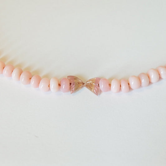 Elegant pink opal bead necklace showcasing a harmonious arrangement of soft pink hues, perfect for any occasion.