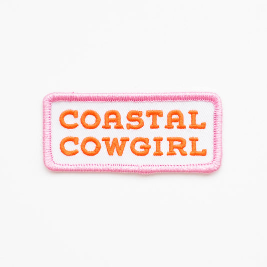Coastal Cowgirl embroidered iron-on patch in orange and pink