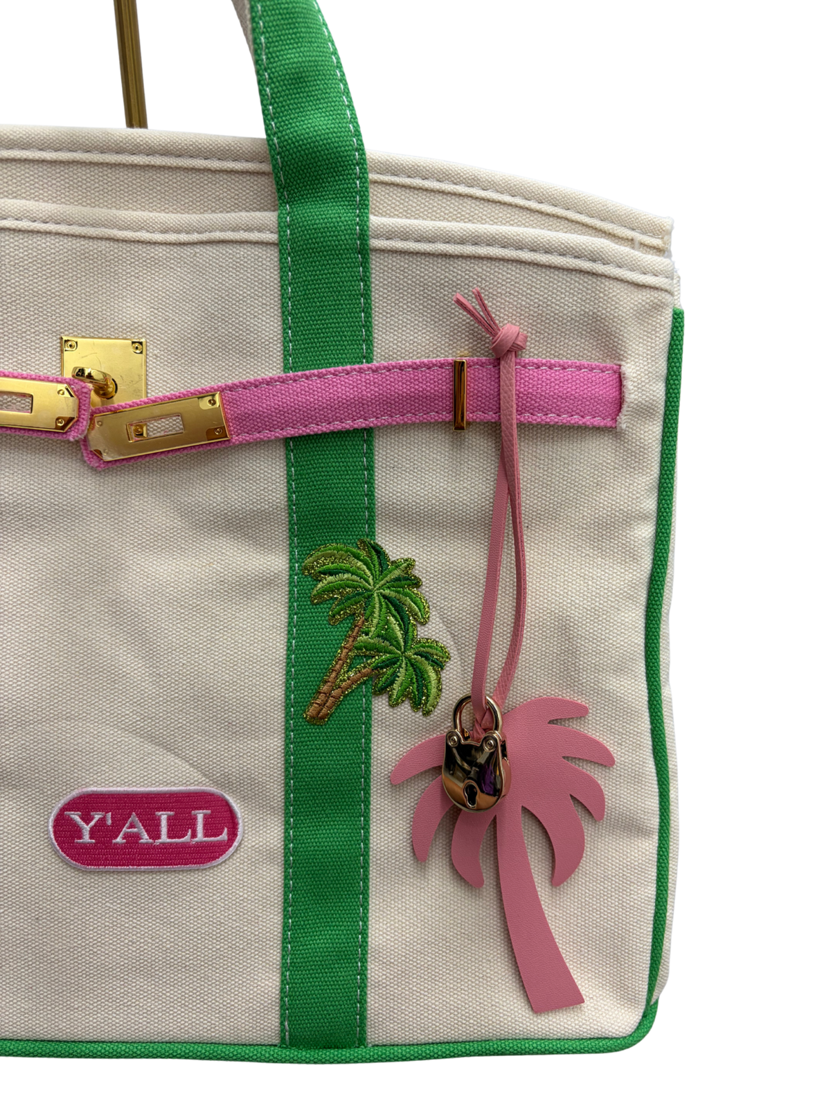 Close-up of a bag with Y'ALL and palm tree logo patch.