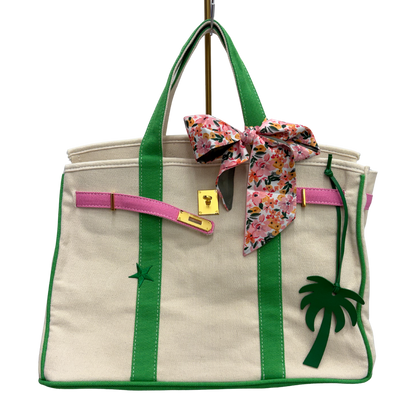 Custom Boatkin bag with pink and green trim and green star.