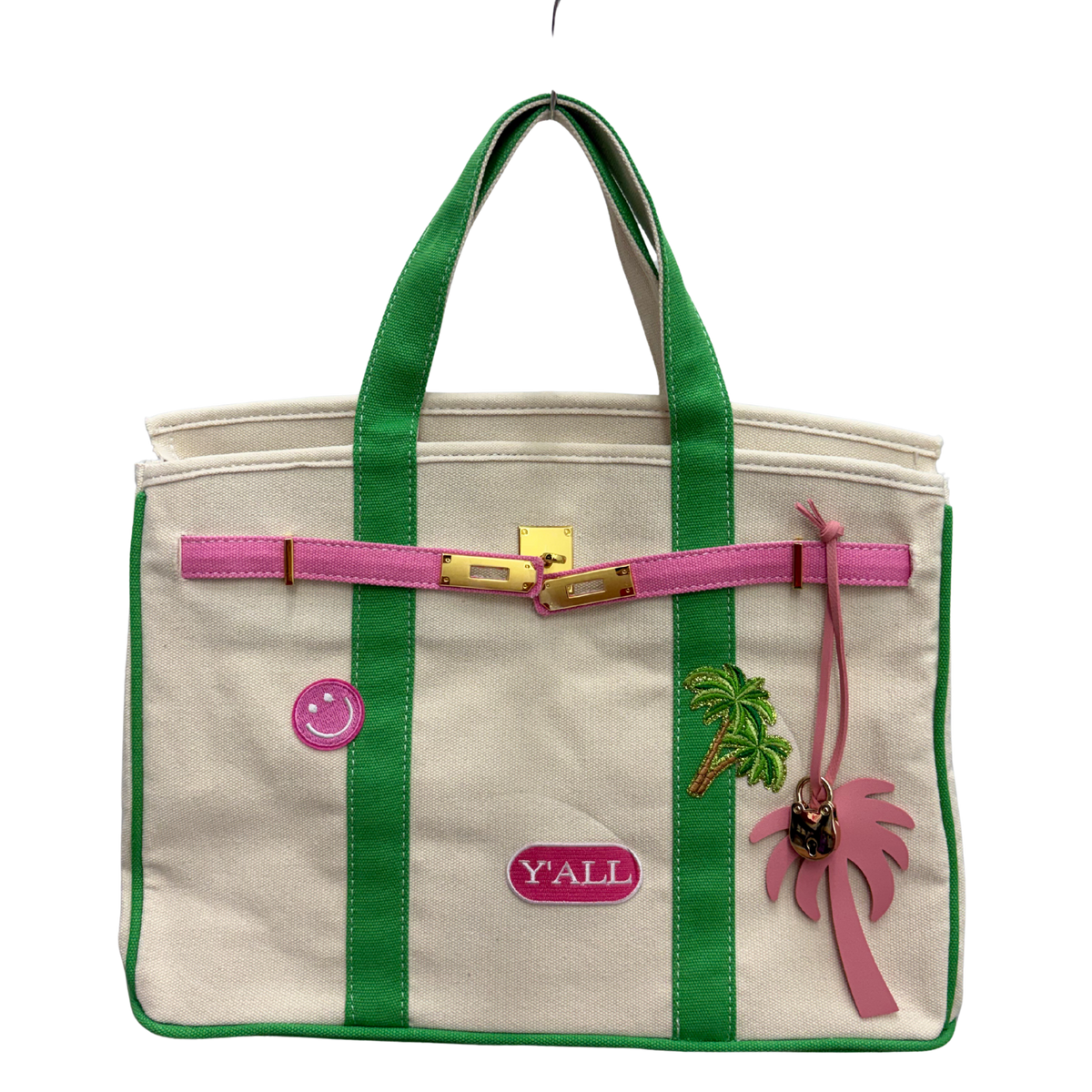Custom Boatkin bag with y'all, smiley face patches and palm tree bag charm.