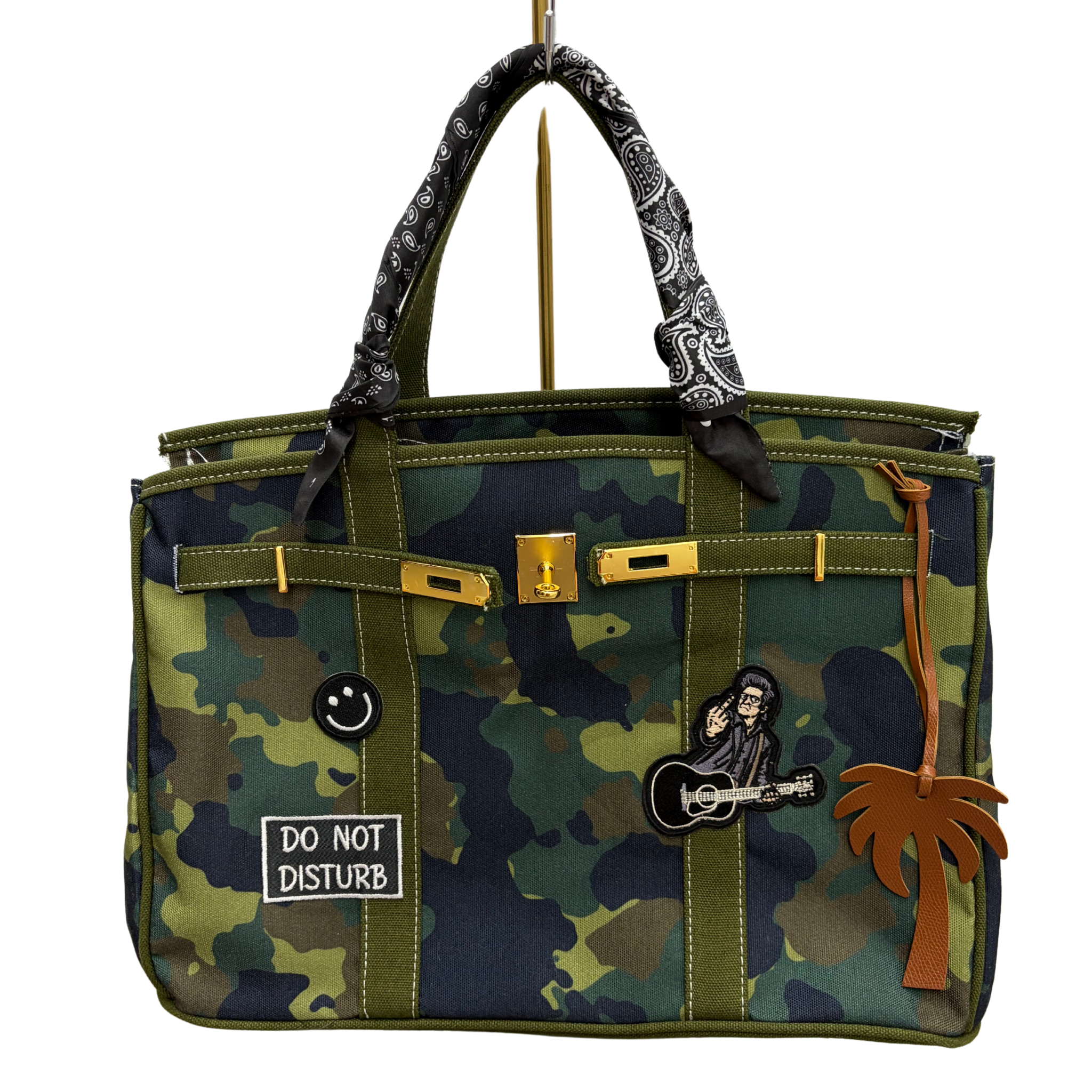 Custom camo Boatkin bag with Johnny Cash iron on patch.