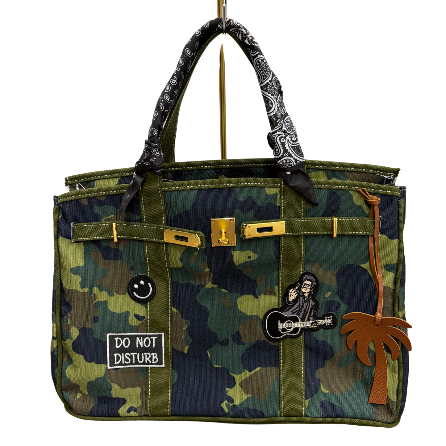 Custom camo Boatkin bag with Johnny Cash iron on patch.