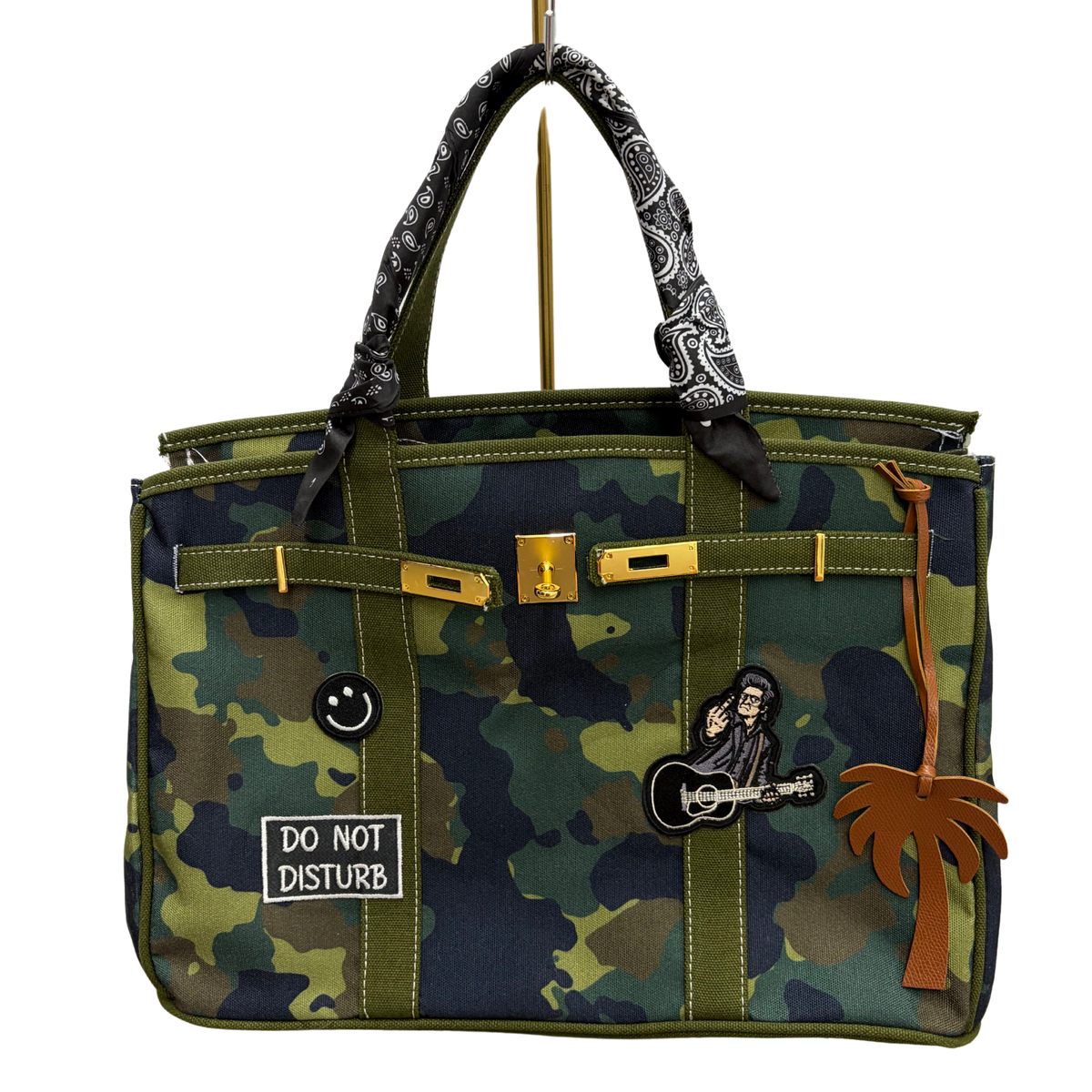 Custom camo Boatkin bag with Johnny Cash iron on patch.