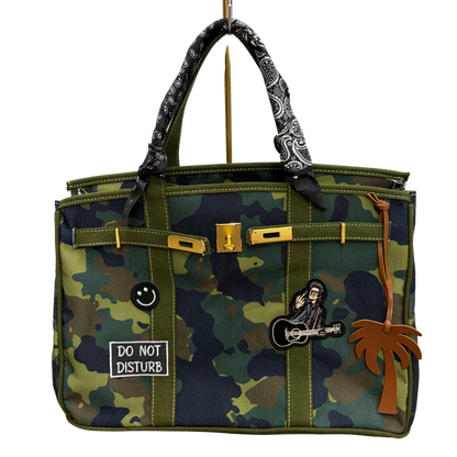 Custom camo Boatkin bag with Johnny Cash iron on patch.