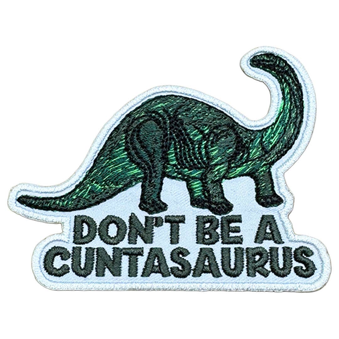 Don't Be a Cuntasaurus embroidered iron-on patch with a green dinosaur