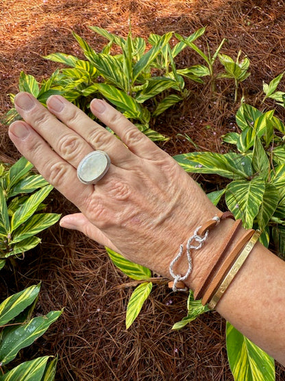 Brown leather wrap bracelet with a hand-forged sterling silver S-clasp