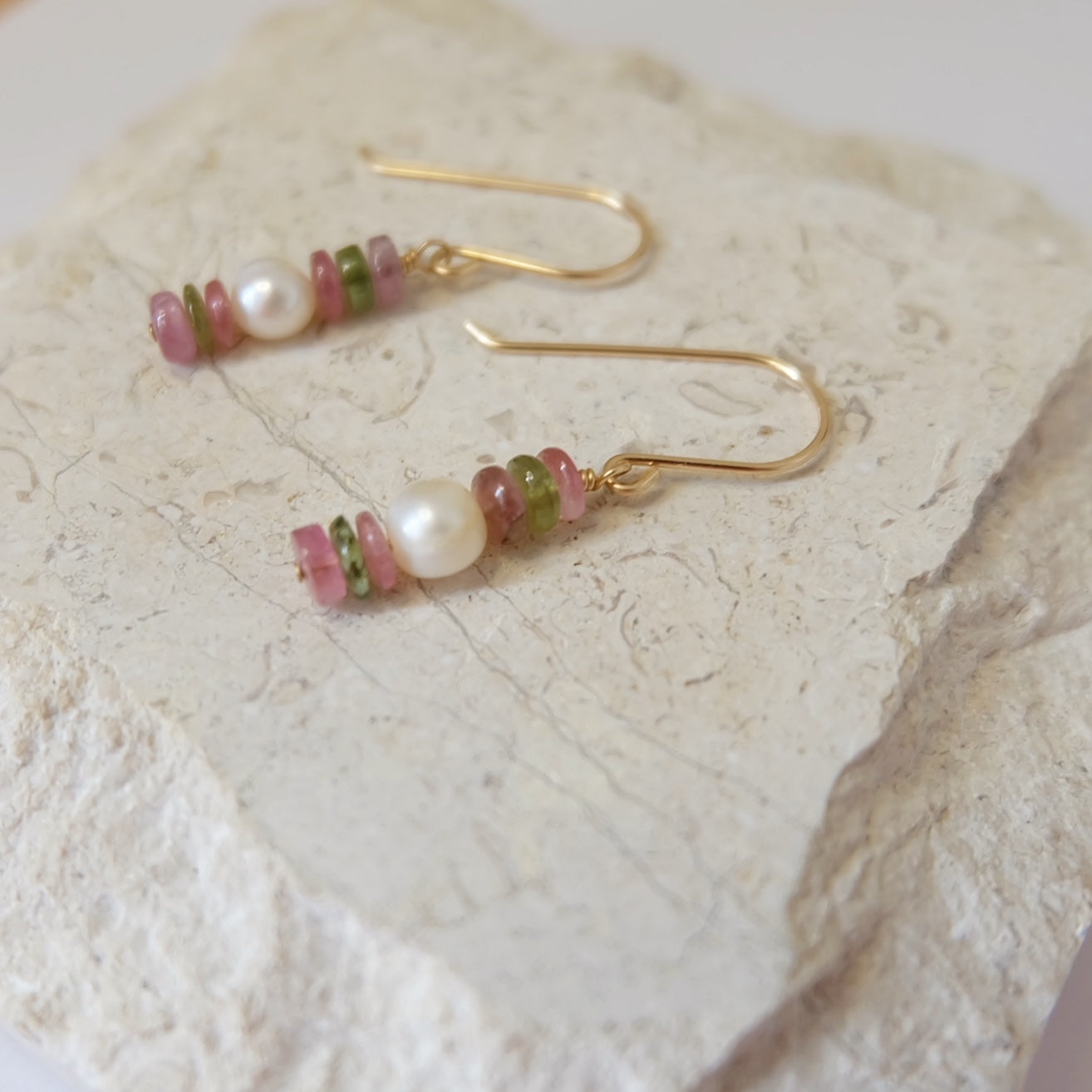 Elegant pearl drop earrings with tourmaline