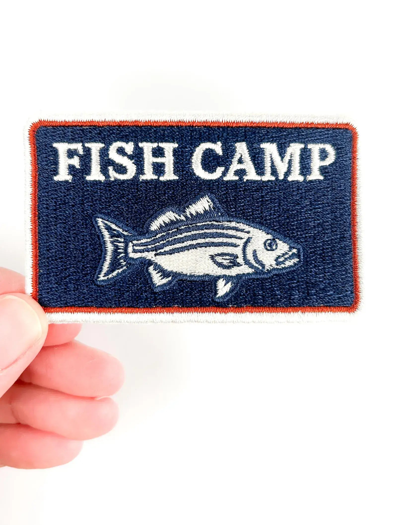 Fish Camp embroidered iron on patch, navy cream and rust red, 1.75x3 inches