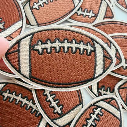 Football embroidered iron-on patch with white laces