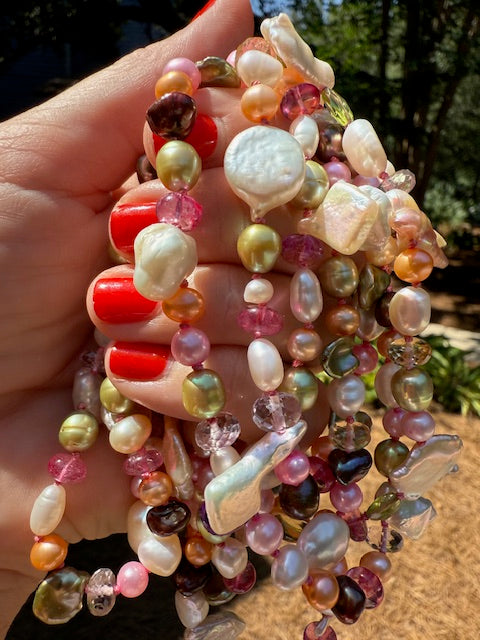 Freshwater pearl and gemstone candy necklace hand-knotted on fuchsia silk
