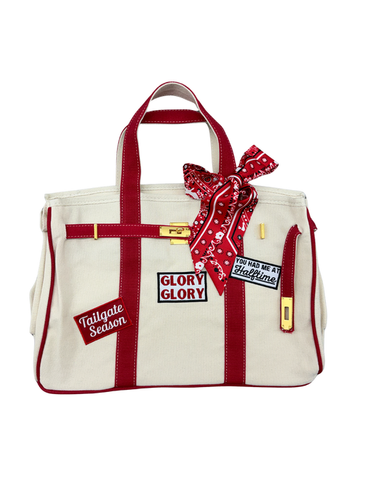 Georgia Bulldogs college football tote bag with red piping, featuring iron on game day patches, a red paisley twilly scarf, and signature gold hardware.
