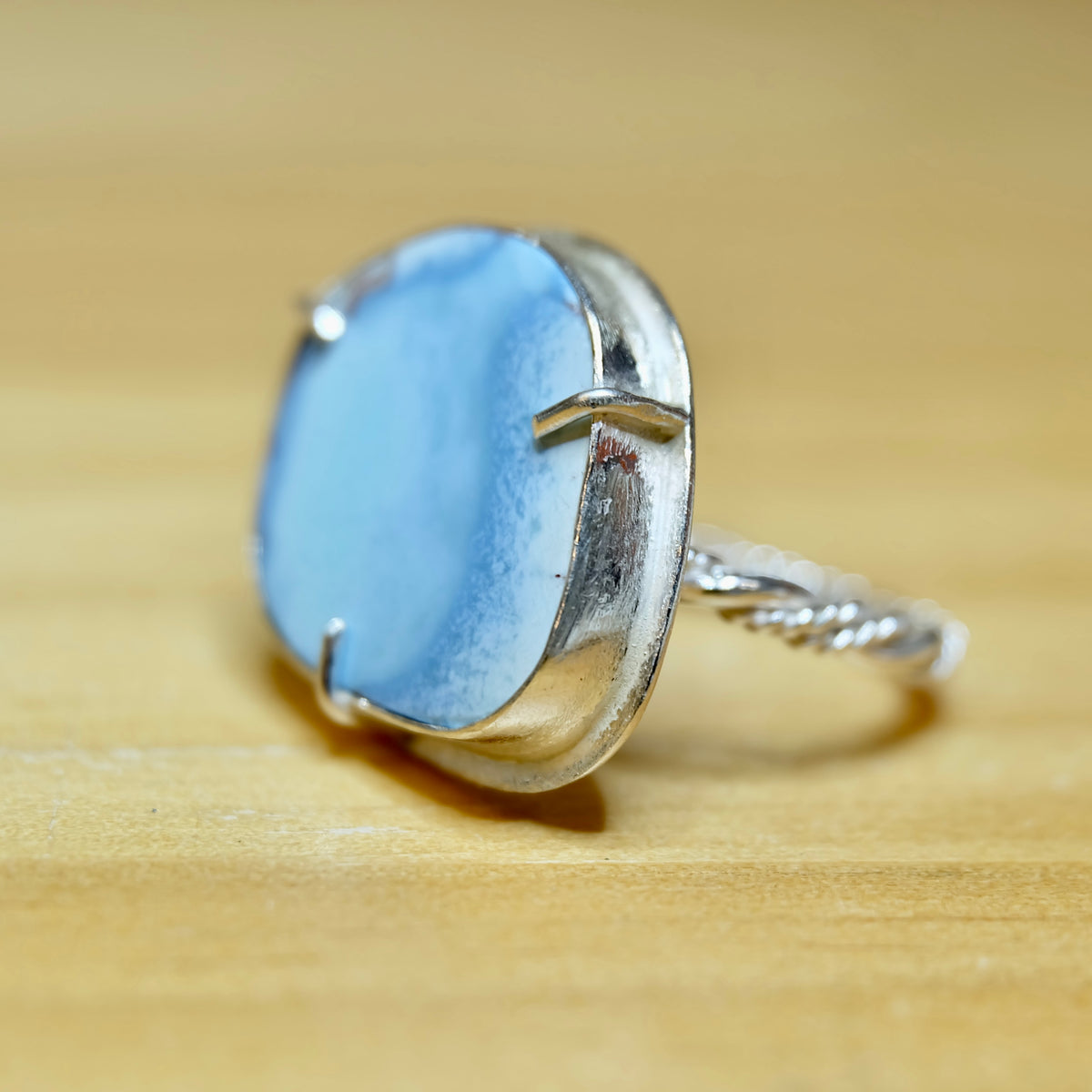 Close-up of Golden Hills turquoise showing lavender-blue color and cocoa matrix