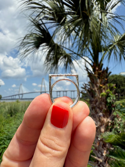 Display of hammered modern offset ring