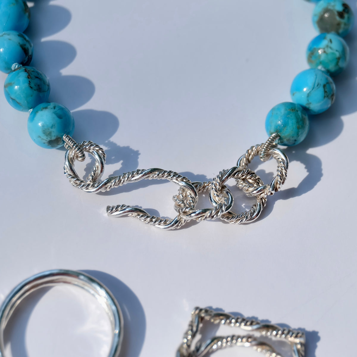 Kingman turquoise bead bracelet with a hand-forged sterling silver S-clasp and extender