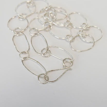 Detail of handmade sterling silver necklace links