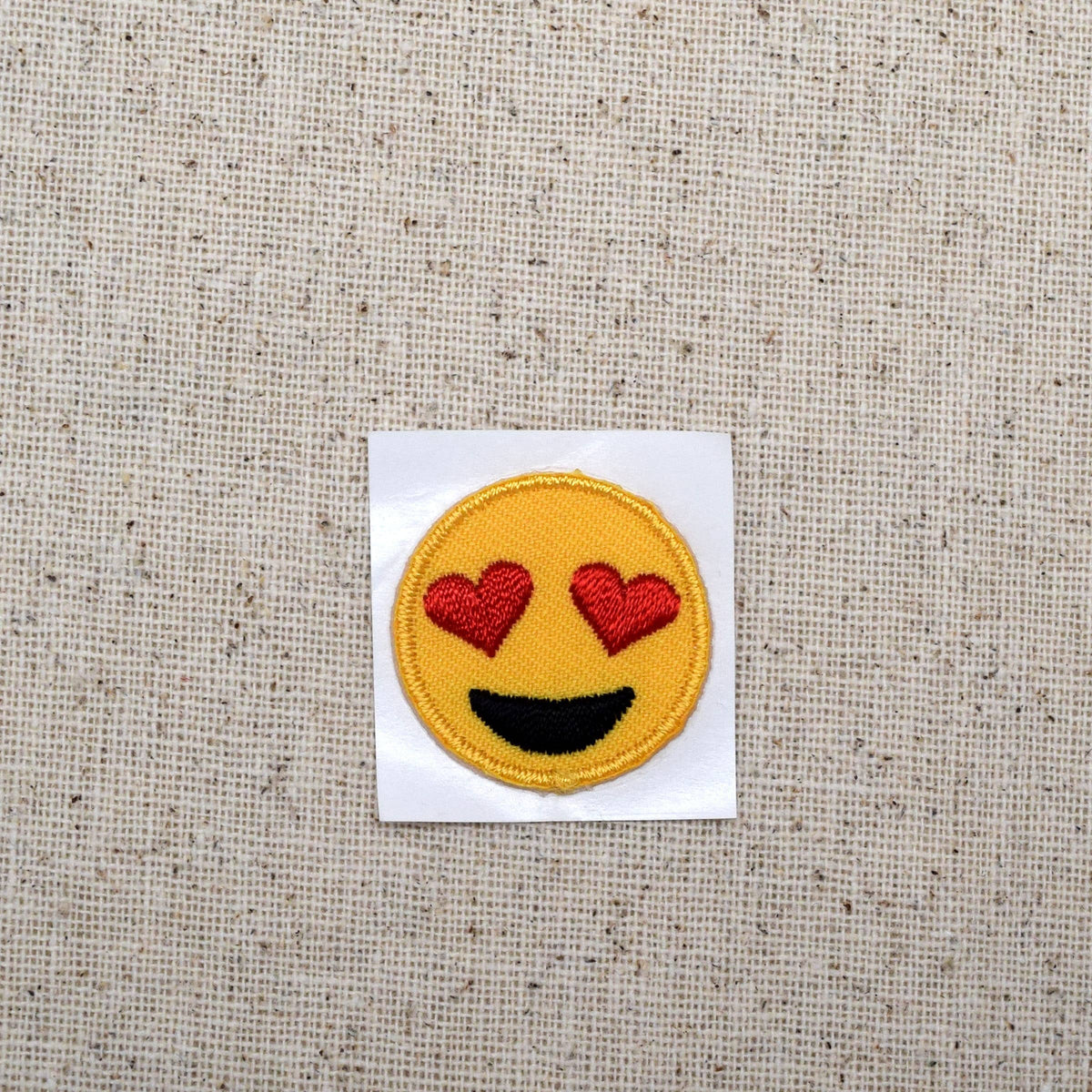 Heart eyes smiley embroidered iron-on patch