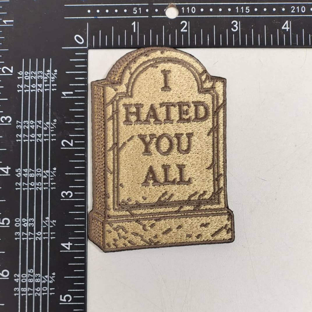 Embroidered with 'I HATED YOU ALL' text on a white background with ruler for scale.