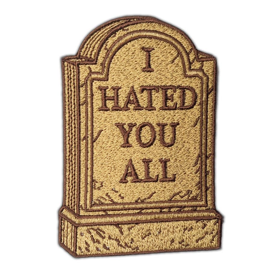 Embroidered patch of a tombstone with 'I HATED YOU ALL' text on a white background