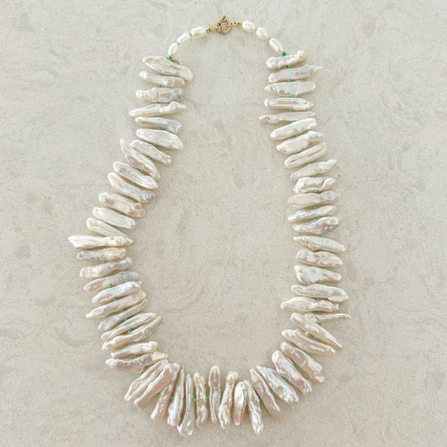 Full strand of a Japanese Biwa pearl necklace on custom-dyed silk