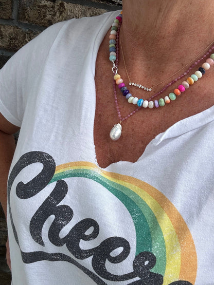 A close-up of a layered gemstone candy necklace made during a Key West jewelry craft class.