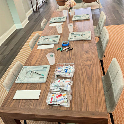 Private workshop table setup for a candy necklace jewelry making party in Key West.