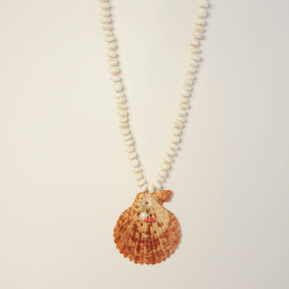 Close-up of a custom handcrafted seashell necklace made in a Key West craft class.