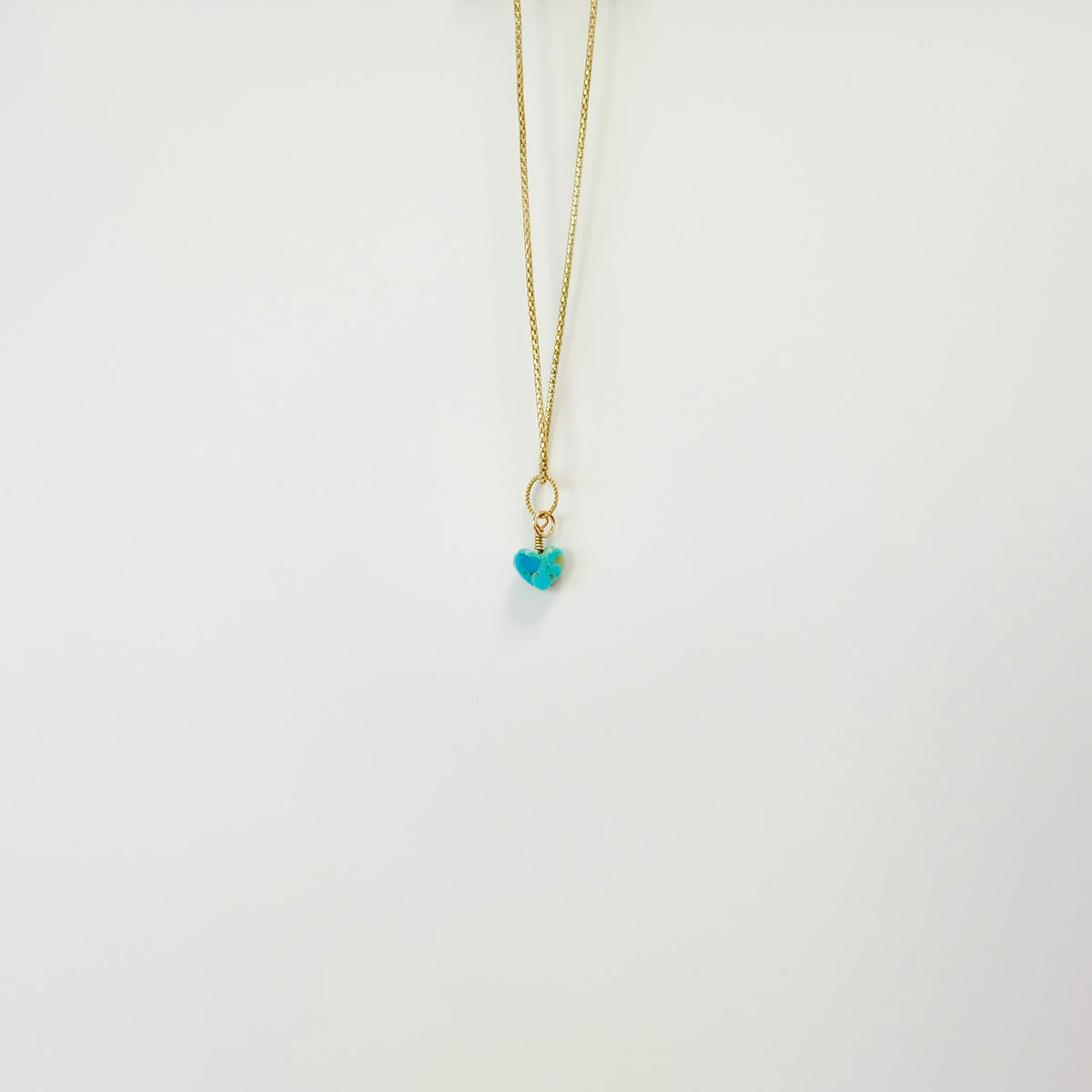 Kingman turquoise heart charm wrapped in 14K gold-filled wire