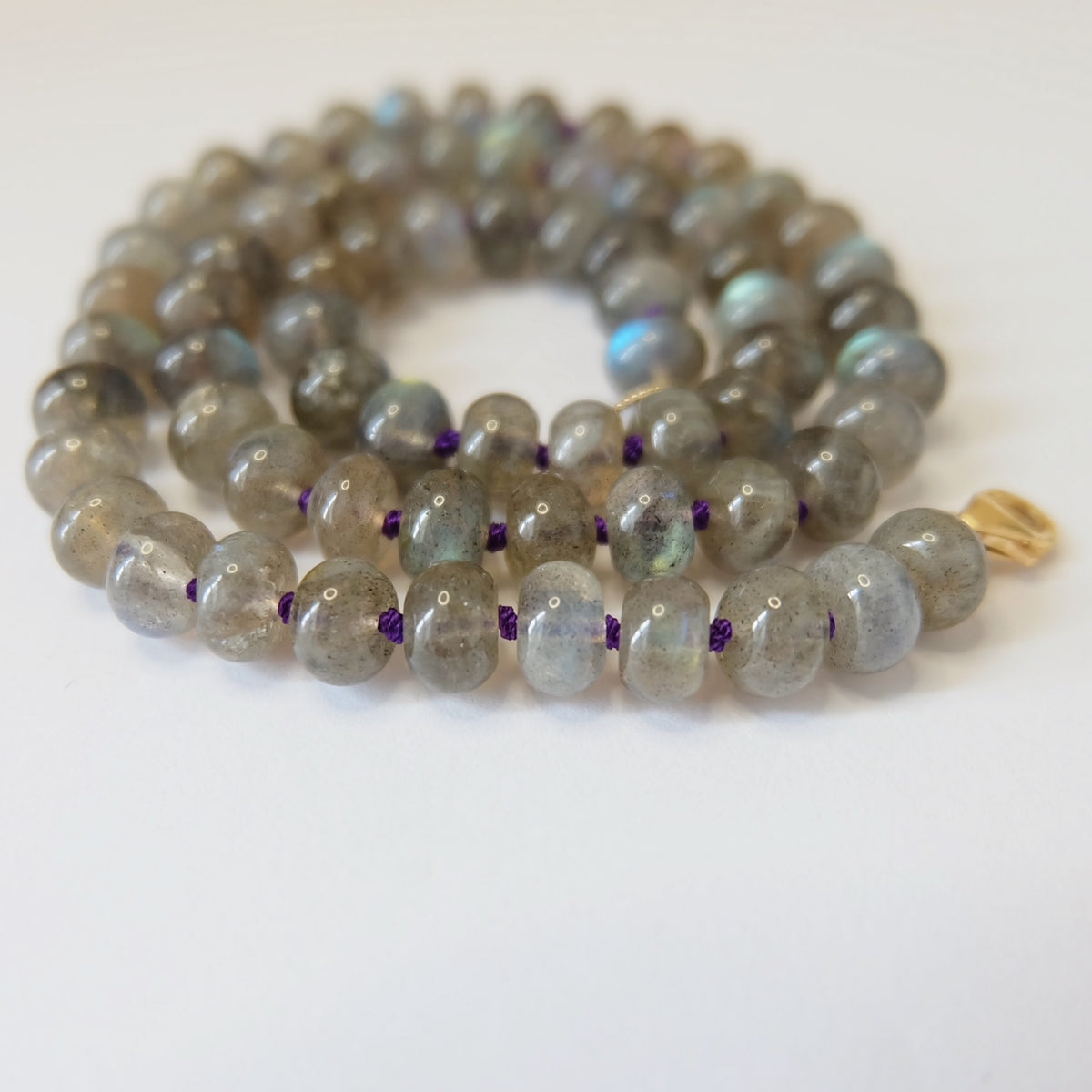 Labradorite beaded candy necklace with faceted beads hand-knotted on purple silk