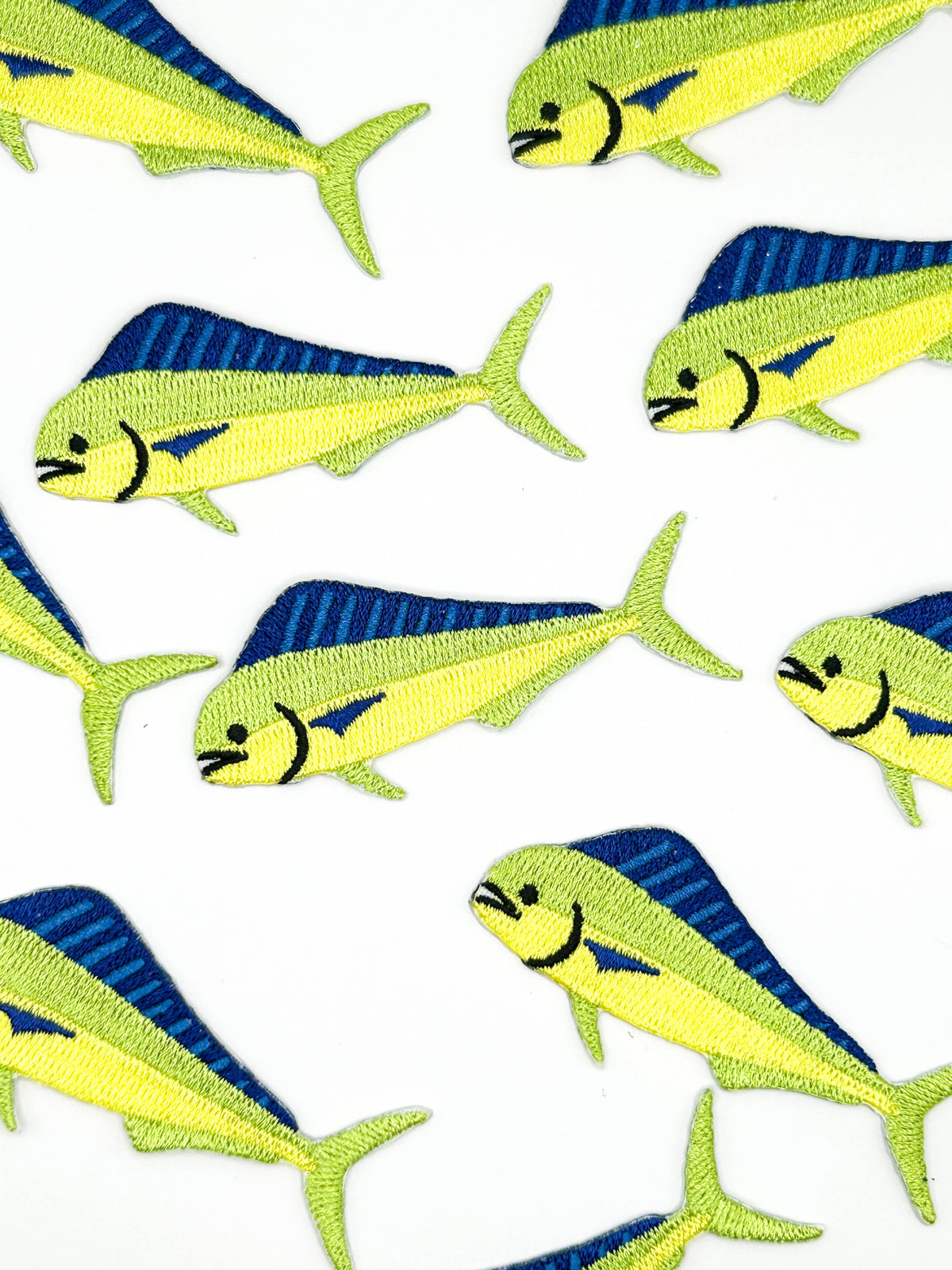 Embroidered mahi mahi applique with stitched outline
