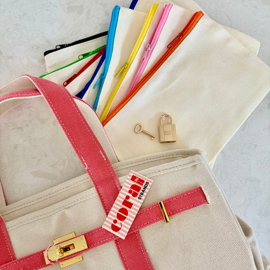 Makeup bag with lock and key, shown with coordinating canvas pouch and zipper colors