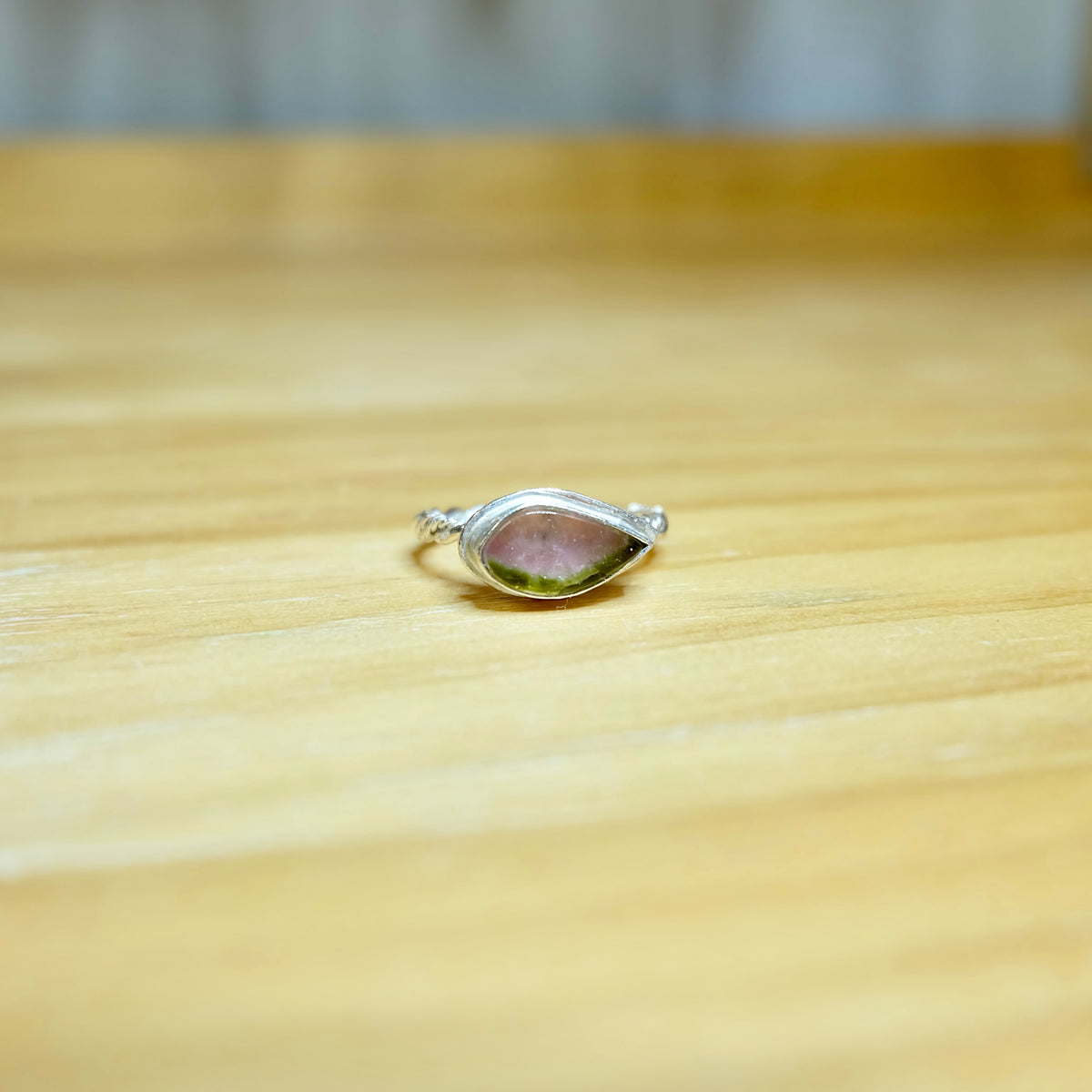Pink and green watermelon tourmaline cabochon in a sterling silver bezel