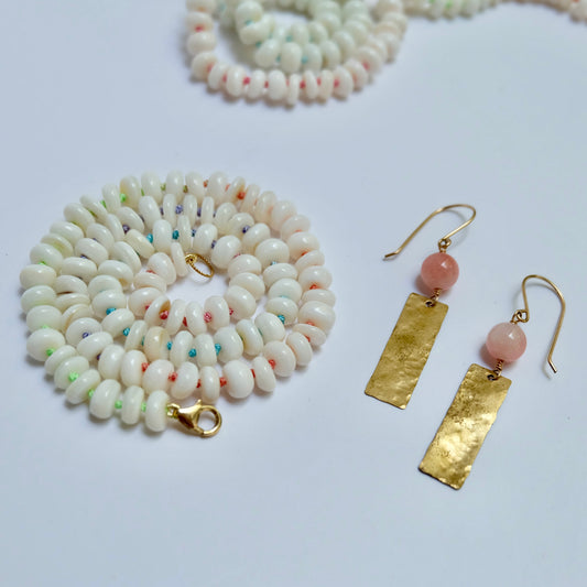Mother of pearl beaded candy necklace hand-knotted on rainbow silk