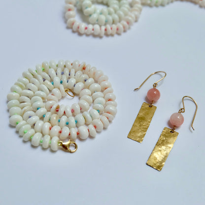 Mother of pearl candy necklace hand-knotted on rainbow silk thread.