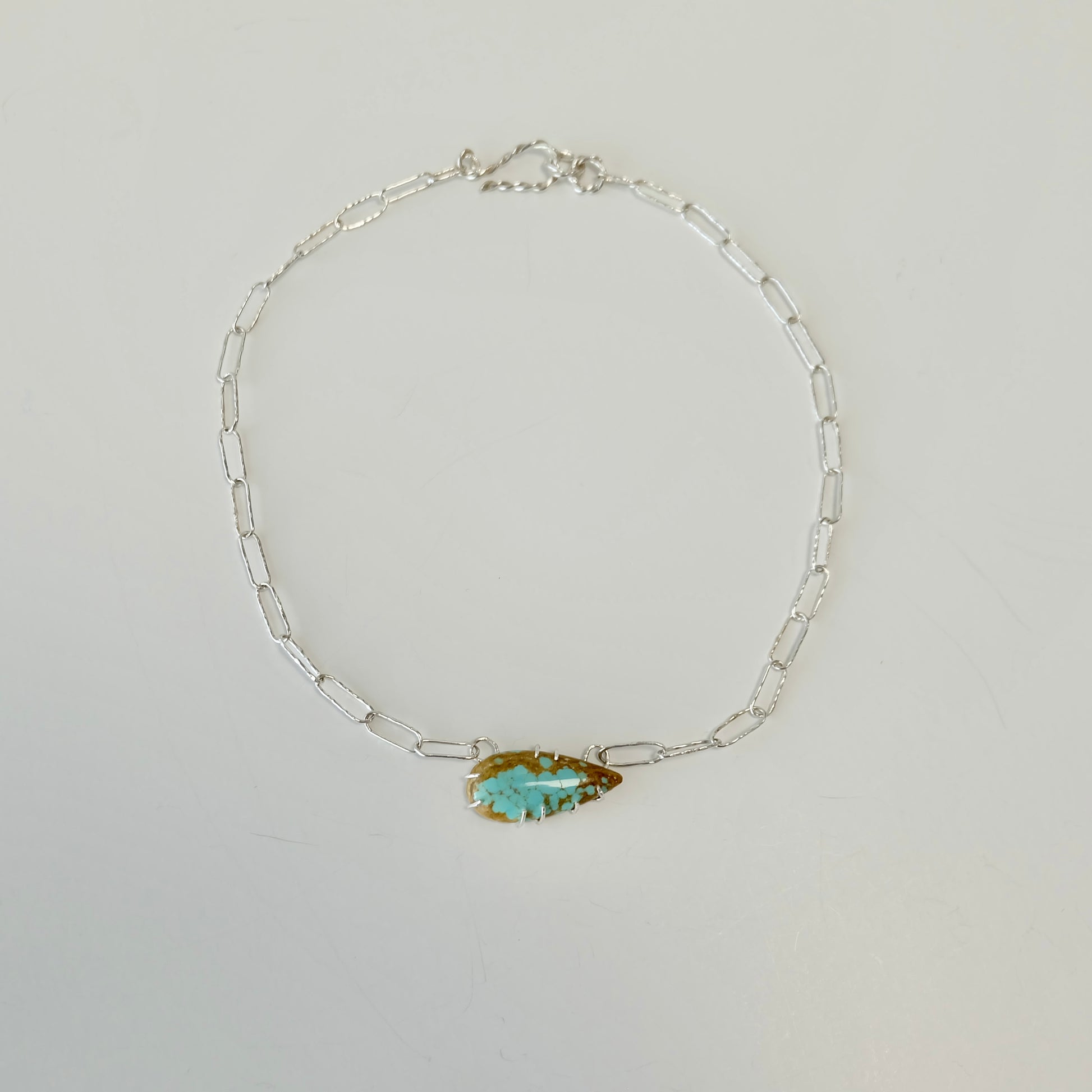 Number 8 Turquoise Paperclip Necklace with a vibrant pear shaped turquoise cabochon and handmade sterling silver links.