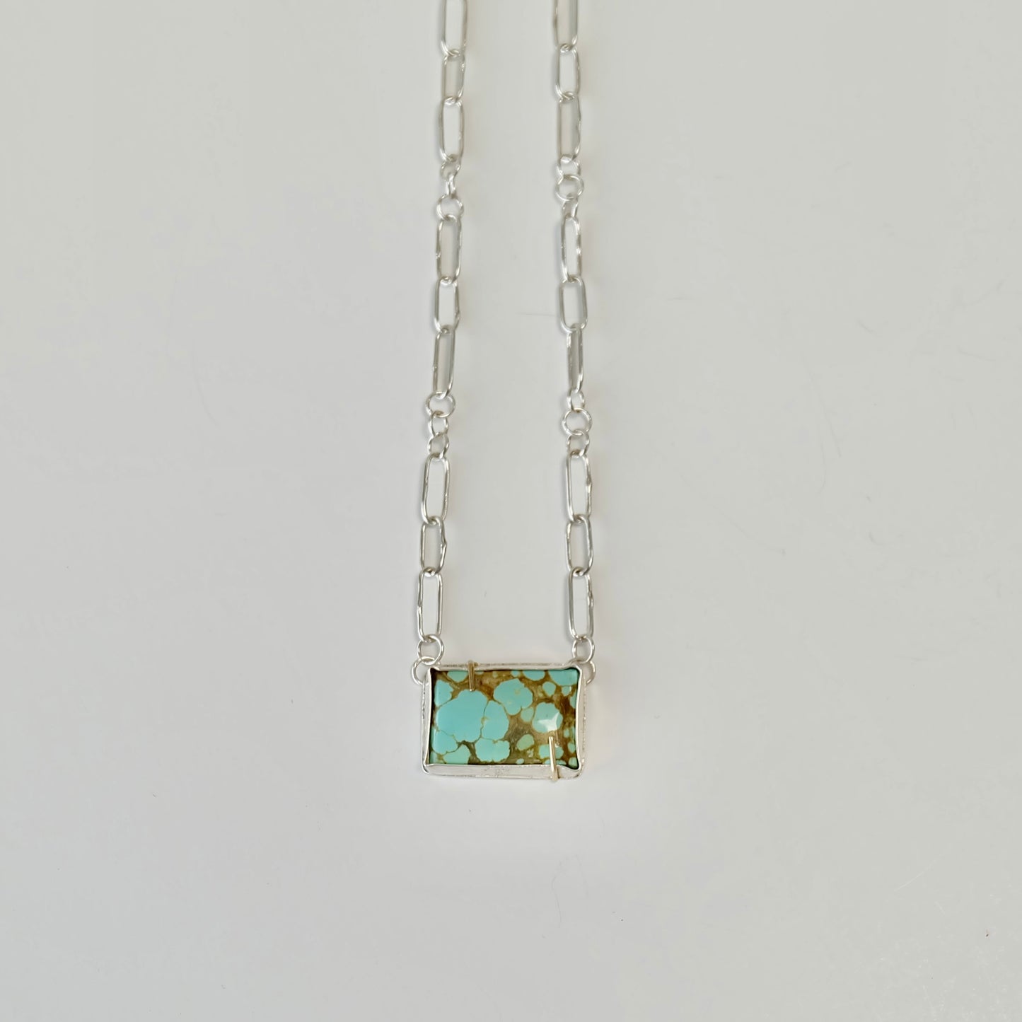 Number 8 Turquoise Paperclip Necklace with a vibrant rectangl turquoise cabochon and handmade sterling silver links.