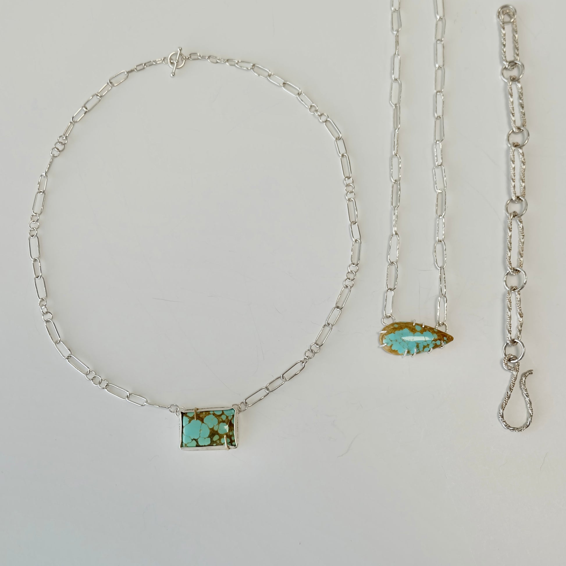 Number 8 Turquoise Paperclip Necklace with a vibrant pear and rectangle shaped turquoise cabochon and handmade sterling silver links.