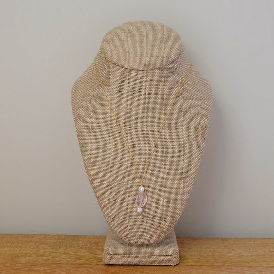 Beautiful morganite and pearl charm necklace, showcasing soft pink hues and classic elegance for any occasion.