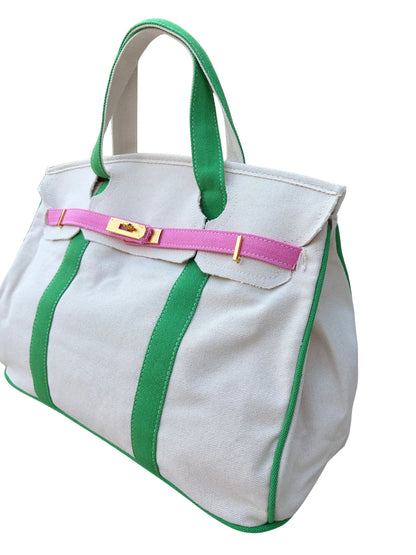 Pink and green Boatkin bag piping on a white background