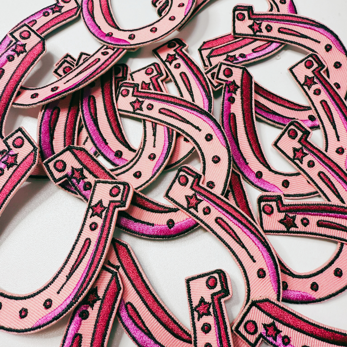 Pink horseshoe embroidered iron-on patch, view 2