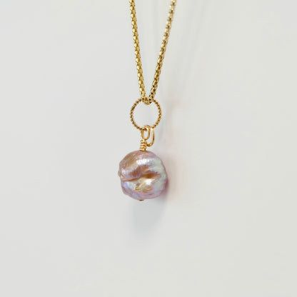 Rosebud freshwater pearl charm with a gold spring clasp