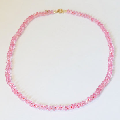 Full strand of a pink topaz beaded candy necklace in 14K gold