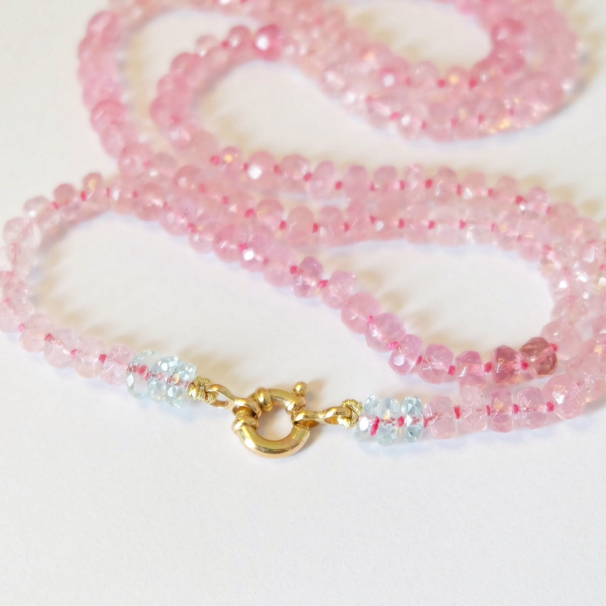 Solid 14K gold clasp detail on a pink tourmaline beaded candy necklace