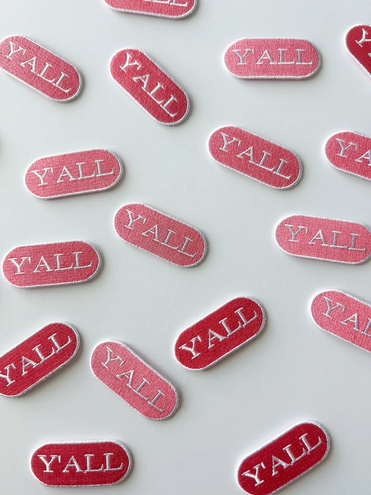 Embroidered pink Y'all applique with iron-on backing