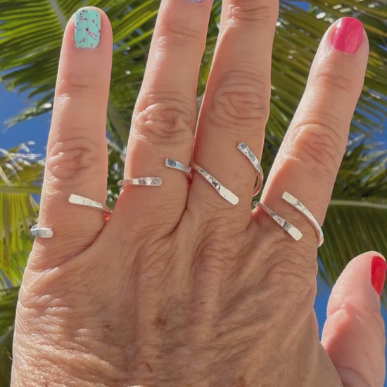  Explore our collection of handmade bypass rings in ethically sourced sterling silver. Perfect for those who appreciate minimalist dainty jewelry with a unique touch.