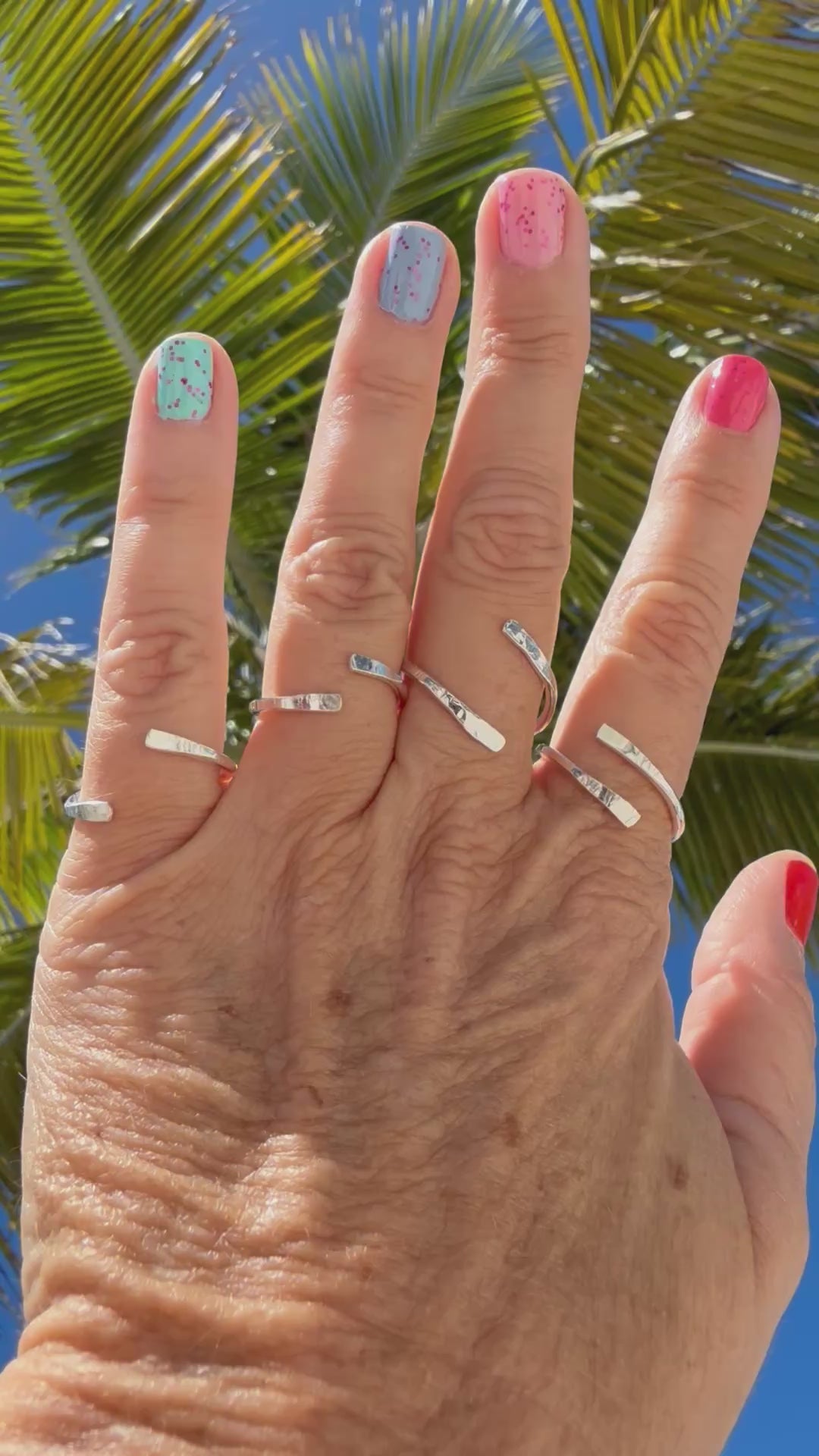  Explore our collection of handmade bypass rings in ethically sourced sterling silver. Perfect for those who appreciate minimalist dainty jewelry with a unique touch.