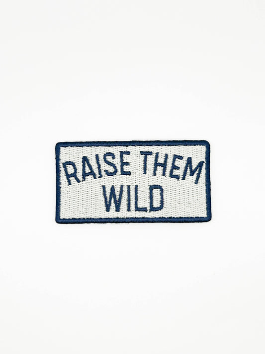 Raise Them Wild patch, 1.5 x 2.75 inches